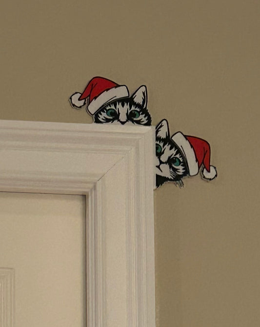 Fun Kittens with Santa hats door corner